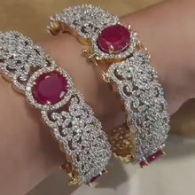 Load and play video in Gallery viewer, Bracelet- Crystals and Ruby red with Gold clasps
