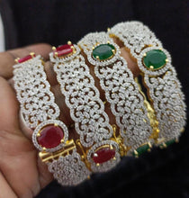 Load image into Gallery viewer, Bracelet- Crystals and Ruby red with Gold clasps MadHug Beauty- Bold and openable is thisbracelet ideal for most wrists size. It is a rare and attractive piece
